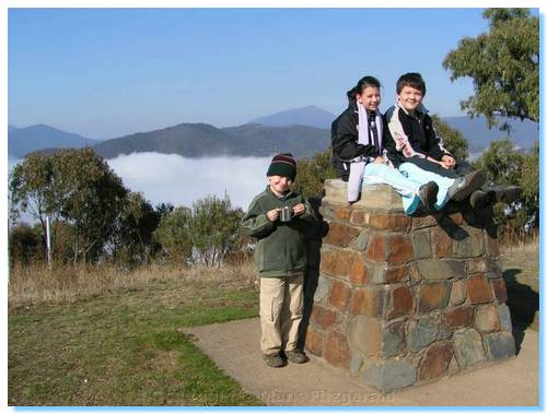 Sitting on top of Mt Pinninger with a Hot Chocolate